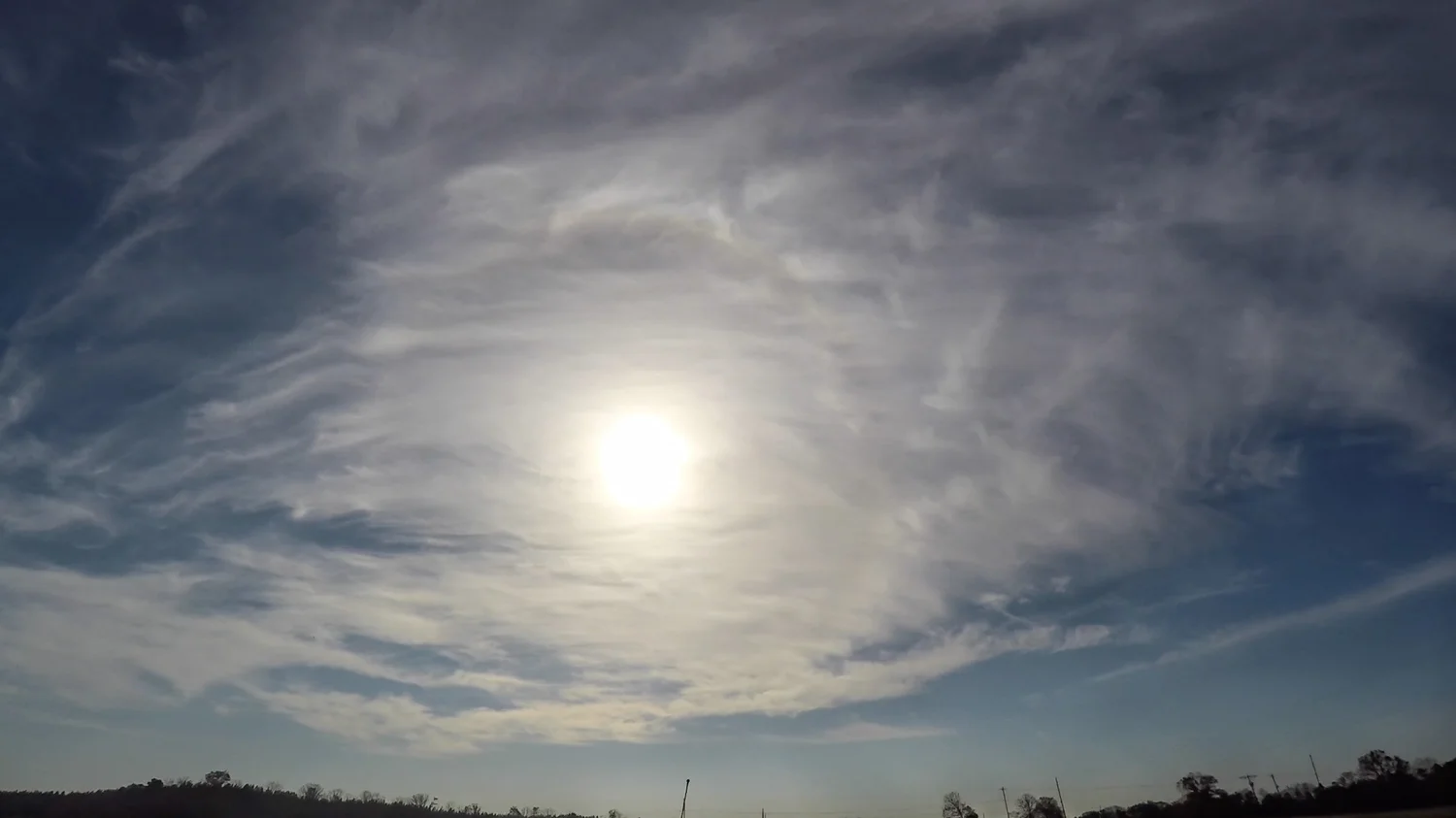 Cirrostratus fibratus (Cs fib) with a 22° halo